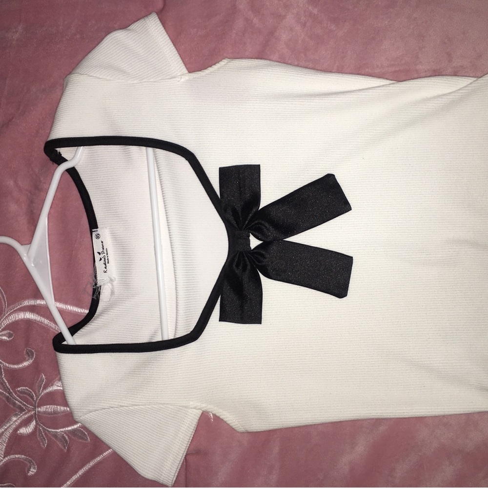 Elegant White Top with Black Bow